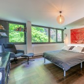 Superbe loft en attique de 340 m2 avec terrasse de 90 m2 dans un écrin de verdure