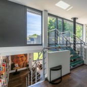 Superbe loft en attique de 340 m2 avec terrasse de 90 m2 dans un écrin de verdure